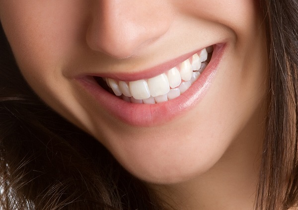 Close up shot of a woman with beautiful smile.