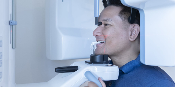 A person getting dental crwons implanted